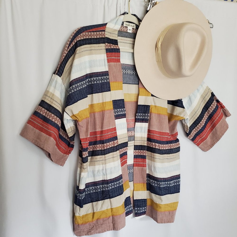 Cousin Earl Poncho Jacket